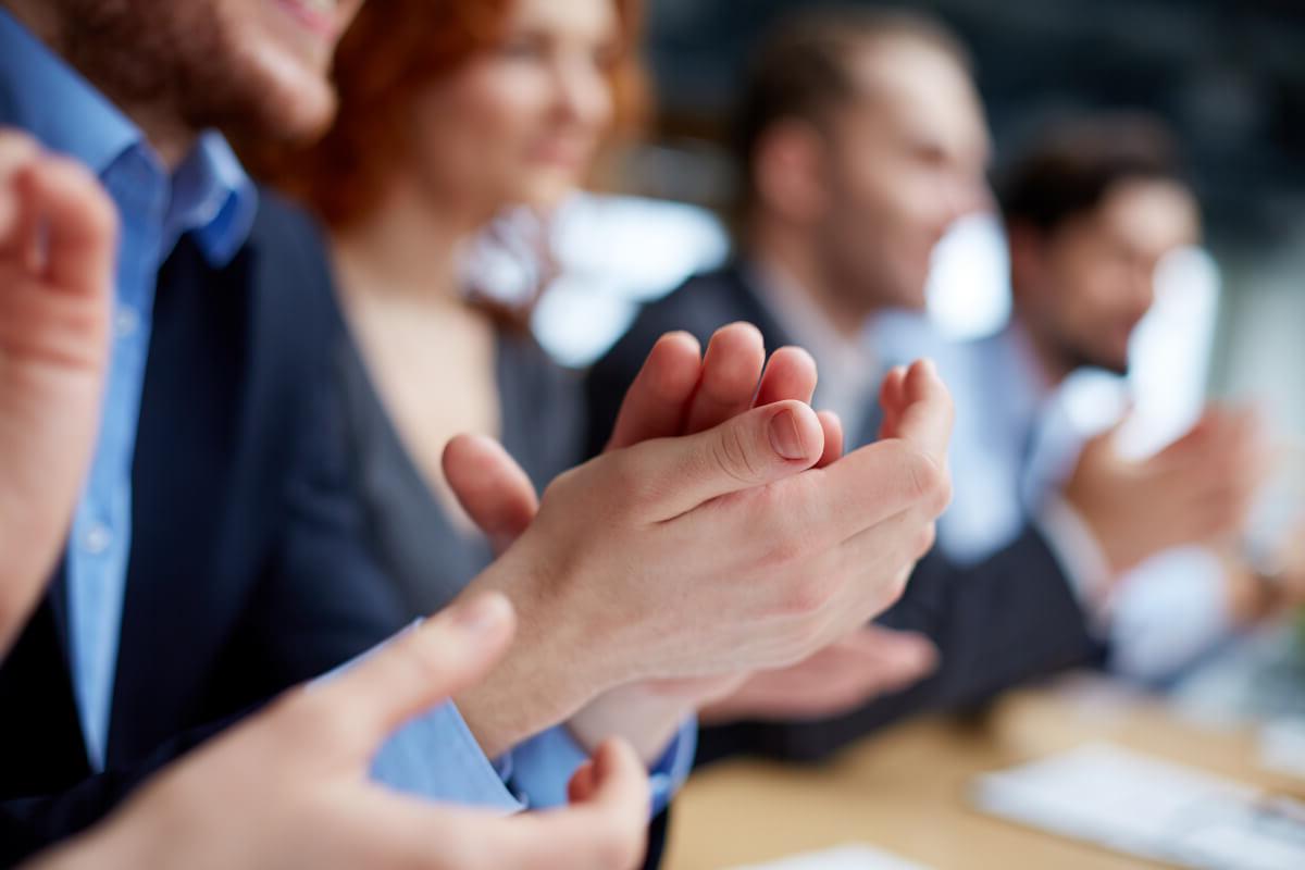 Close Up Business People's Hands Clapping
